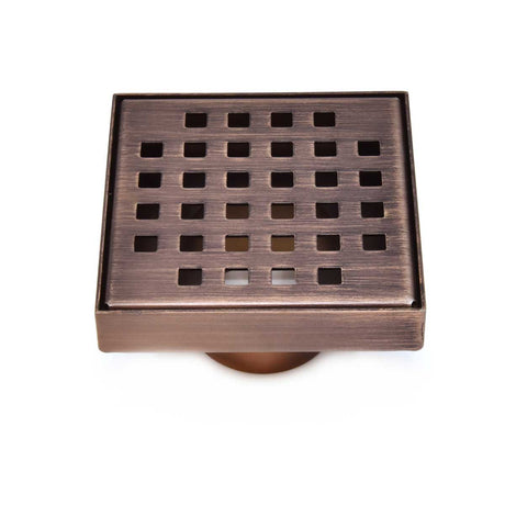 Bronze square drain cover with grid pattern on a white background