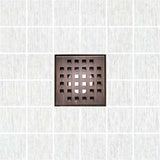 Serene Square Drain in Bronze over porcelain tile floor