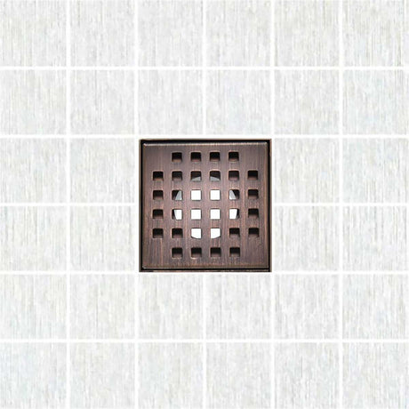 Serene Square Drain in Bronze over porcelain tile floor