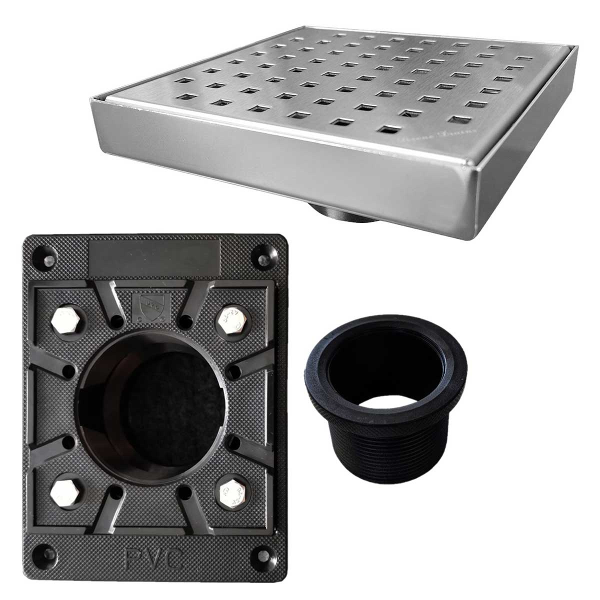 Collection of drain components including a metal grid, PVC fitting, and black rubber washer on a white background.