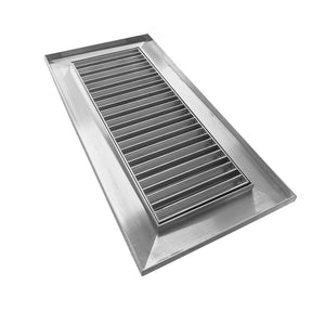 Chameleon flush mount tile floor vent register installed in a tiled floor for a seamless hidden appearance.