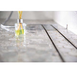SereneDrains Linear Shower Drain Tile Insert Brushed Nickel over mosiac penny round porcelain tile