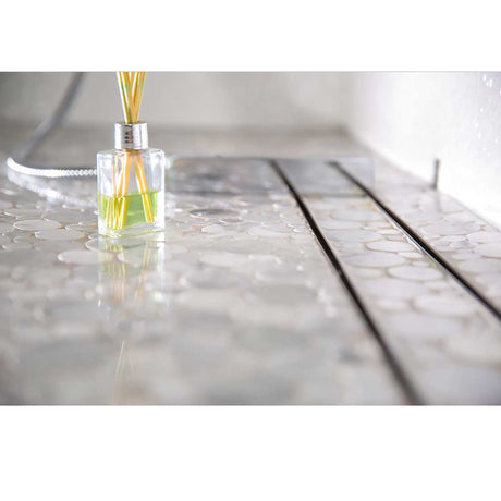 SereneDrains Linear Shower Drain Tile Insert Brushed Nickel over mosiac penny round porcelain tile