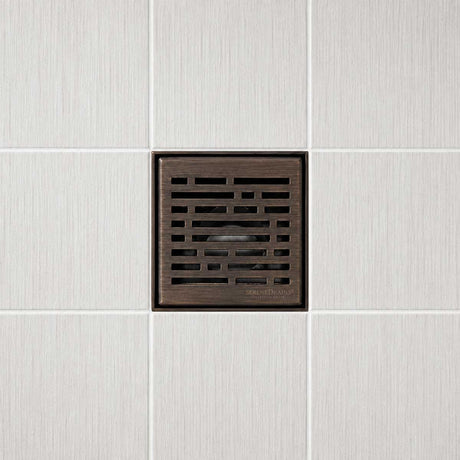 4 inch square shower drain with Broken Lane pattern Oil Rubbed Bronze finish