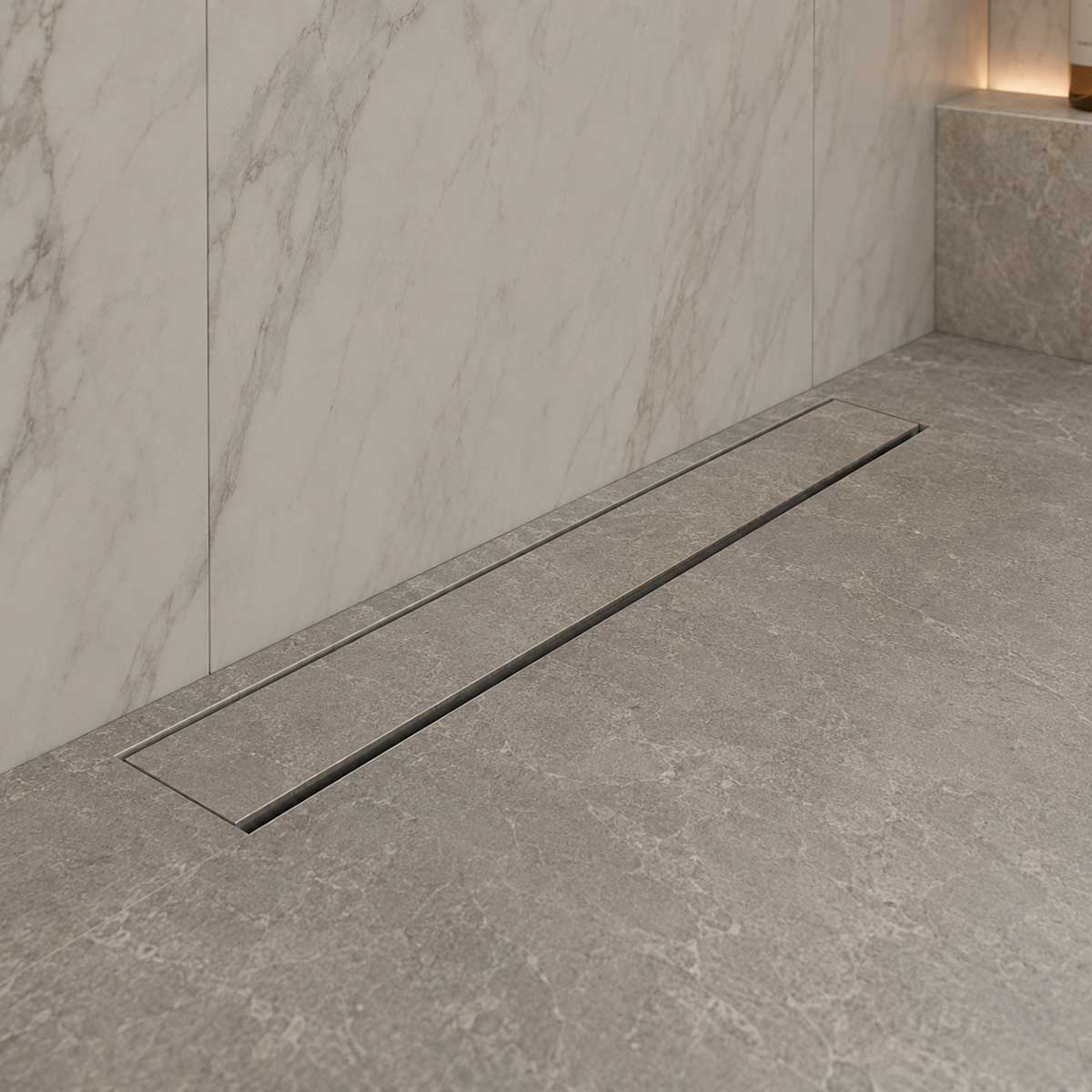 Waterproof tile-ready linear shower drain in modern bathroom