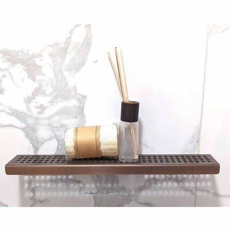 Serene Bronze Rectangle shower shelf in a modern marble shower