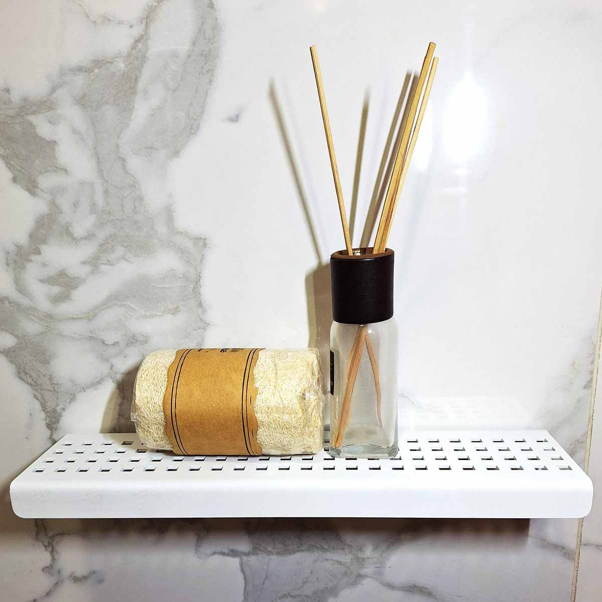 Serene Matte White Rectangle stainless steel shower shelf in a modern marble shower
