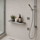 SereneDrains Brushed stainless steel Ocean Wave shower shelf for modern bathroom
