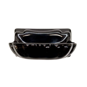 Black Glossy Porcelain soap dish bathroom accessory designed to blend with surrounding tile. 