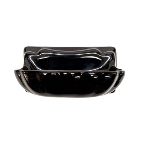 Black Glossy Porcelain soap dish bathroom accessory designed to blend with surrounding tile. 