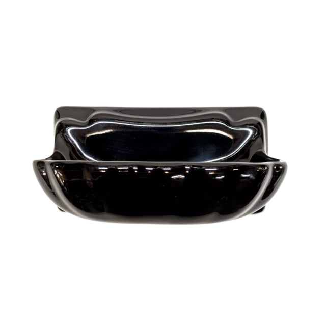 Black Glossy Porcelain soap dish bathroom accessory designed to blend with surrounding tile. 