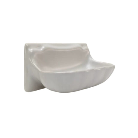 Porcelain soap and shampoo dish in Matte White integrated into a tile shower surround. 