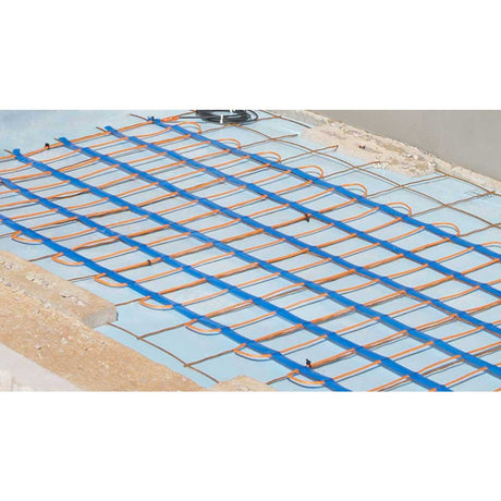 Underfloor heating cable laid out on a floor with blue insulation