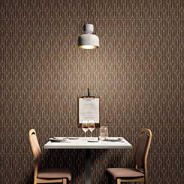 Dining area with a table and chairs against Takao Red Cedar 3x6 3D Matte Porcelain Wall Tile.