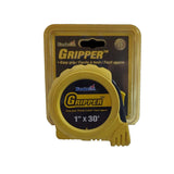 Gripper tape measure with nylon coated steel blade and shock absorber