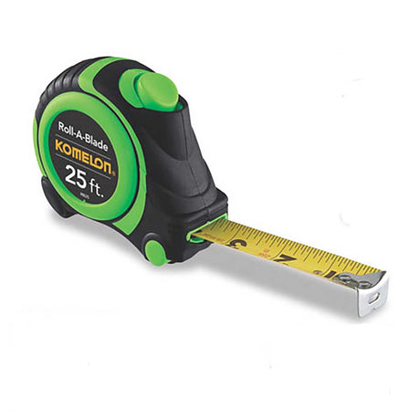 Komelon tape measure with green and black casing on a white background