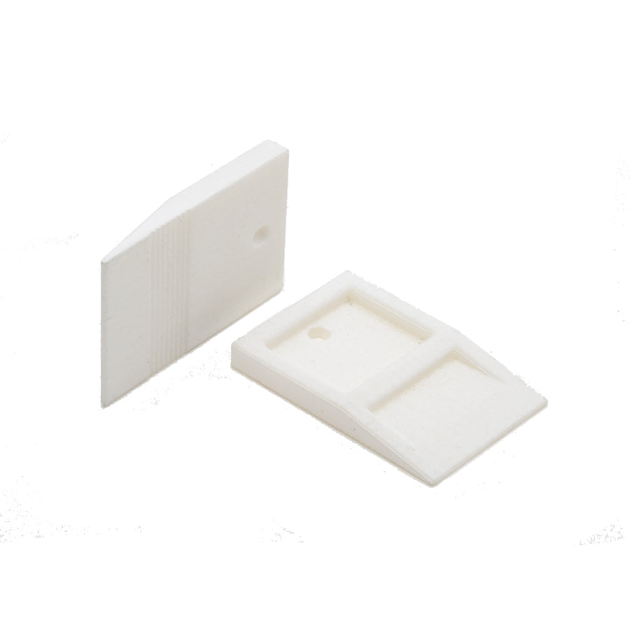 White 1/8 inch (3 mm) TAVY tile leveling wedge for precision tile alignment and consistent grout joints