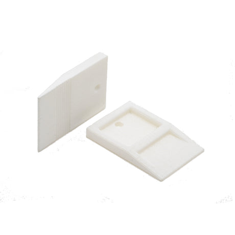 White 1/8 inch (3 mm) TAVY tile leveling wedge for precision tile alignment and consistent grout joints