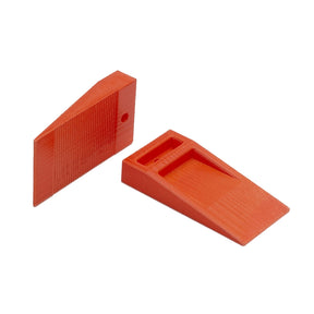 Orange 1/4 inch (6 mm) TAVY tile leveling wedge for thick tile installations and professional leveling
