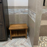 Teak shower bench with storage in spa bathroom