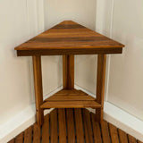 Mini teak corner bench installed in small shower