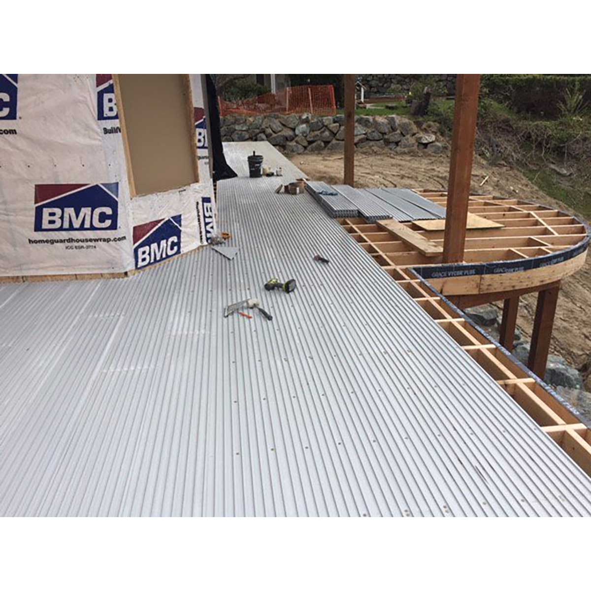 Construction site with a floor being installed, featuring TI-ProBoard Underlayment for Tiling Outdoor Decks