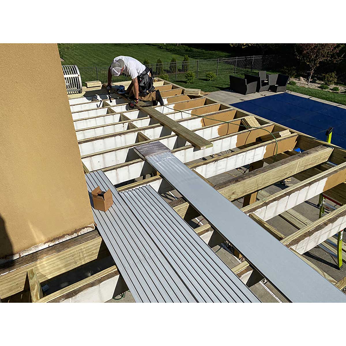 Construction site with a floor being installed, featuring TI-ProBoard Underlayment for Tiling Outdoor Decks