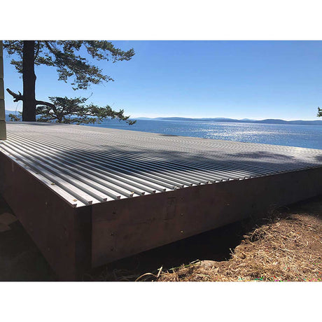 Construction site with a floor being installed, featuring TI-ProBoard Underlayment for Tiling Outdoor Decks