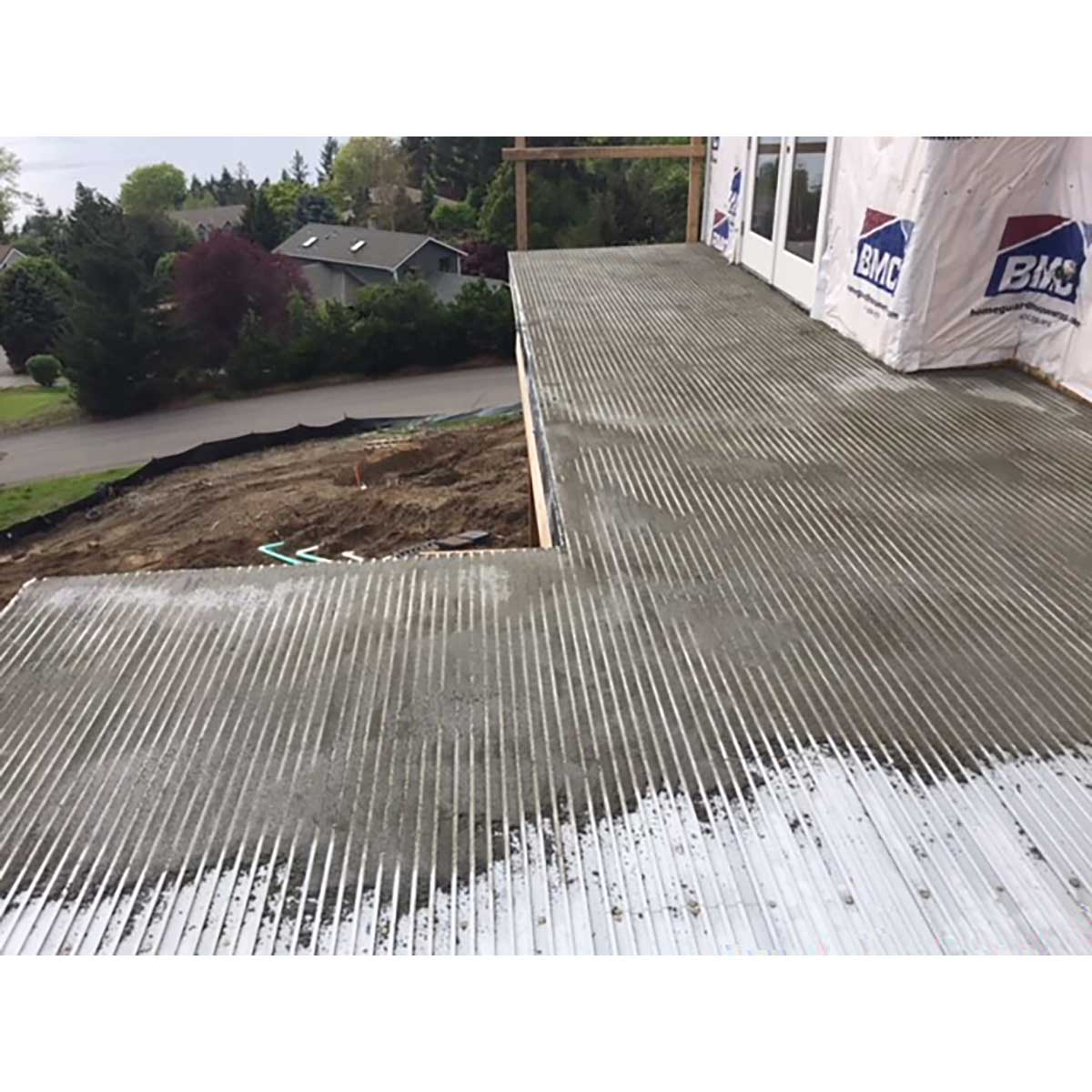 Construction site with a floor being installed, featuring TI-ProBoard Underlayment for Tiling Outdoor Decks