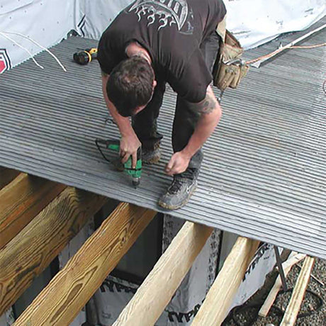 Construction site with a floor being installed, featuring TI-ProBoard Underlayment for Tiling Outdoor Decks
