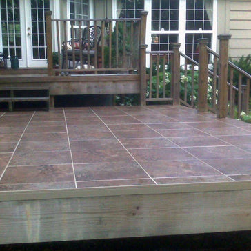 A finished installed deck featuring TI-ProBoard Underlayment for Tiling Outdoor Decks 