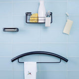 TileWare Promessa Rectangular Soap Basket with Towel bar on a blue tile wall