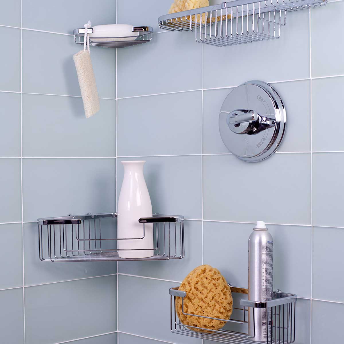 TileWare Promessa bathroom accessories show case install over blue wall tile