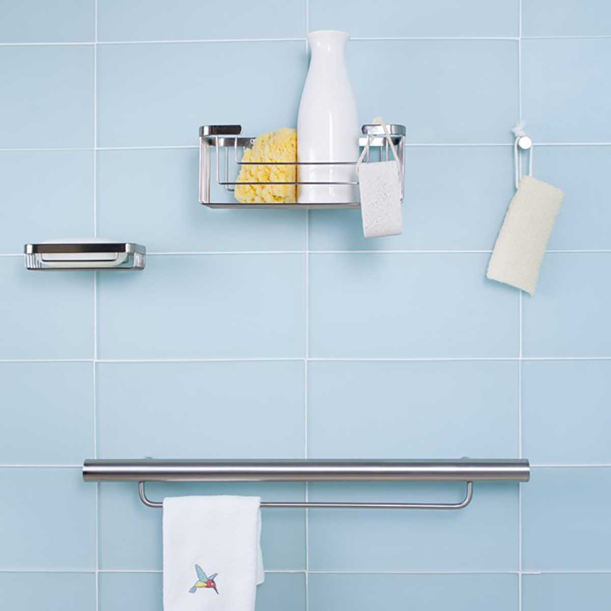 TileWare Promessa Rectangular Soap Basket with Towel bar on a blue tile wall