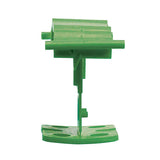Green tile leveling clips with 1/8 grout spacing for floor tile