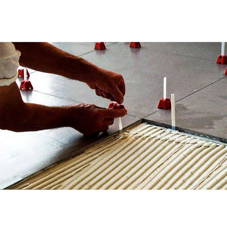 Tuscan Tile Leveling System with reusable caps, straps, and installation tool