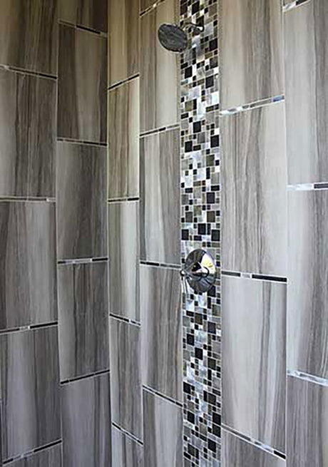 Decorative aluminum and glass backsplash tile installation