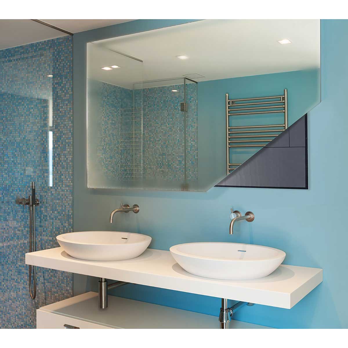 Warmup Mirror Defoggers Pad Installed behind a mirror 